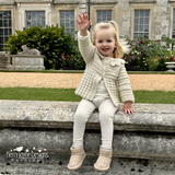 Child wearing the Bridgerton cardigan 