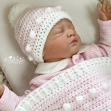 Pink baby blanket and hat