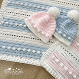 Blue and pink baby hats