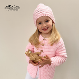 Little girl wearing a crochet cardigan by kerry jayne designs 