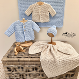 shows 2 cardigans in basketweave stitch, a pattern by Kerry Jayne Designs 