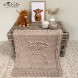 Highland cow baby blanket crochet pattern with textured bobble stitch design