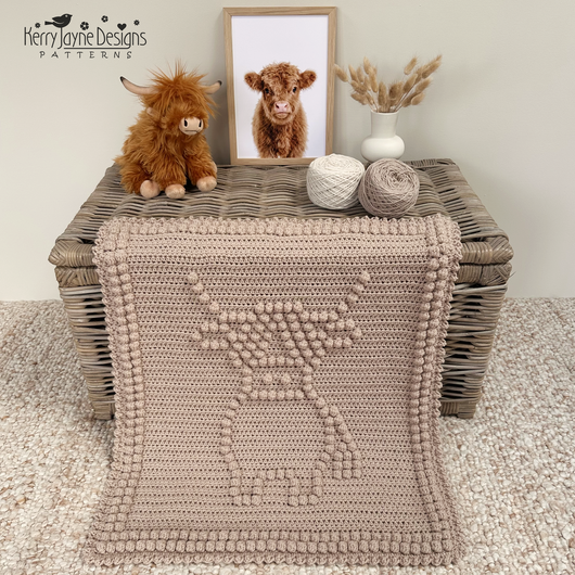 Highland cow baby blanket crochet pattern with textured bobble stitch design