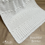White crochet border on a wooden surface with 'Kerry Jane Designs' branding.