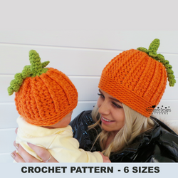 A woman and a baby wearing matching orange pumpkin-shaped crocheted hats with green leafy tops. 
