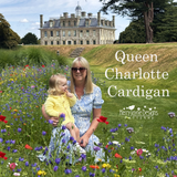 Woman and child in a garden with a historic building in the background, featuring 'Queen Charlotte Cardigan' text.
