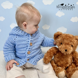 Baby wearing a crochet hoodie