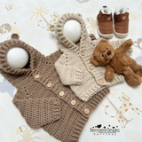 A display of crochet hoodies 