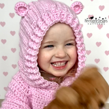 CHILD WEARING A CROCHETED HOODED JACKET