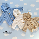 Crocheted hoodies laid out