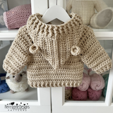 A beige hooded jacket with bear ears 