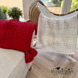 Snowflake crochet blanket on a chair