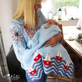 Kerry Jayne Designs holding baby