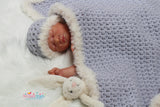 Fur edged crochet blanket