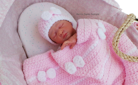 Pink baby hat with shop bow