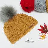 Crochet hat with fluffy pompom